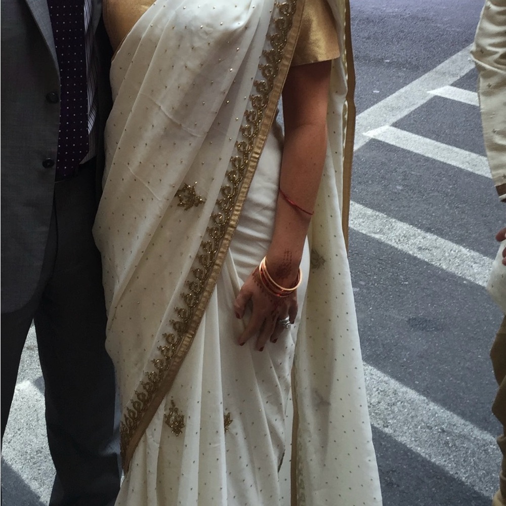 Elegant White and Gold Saree